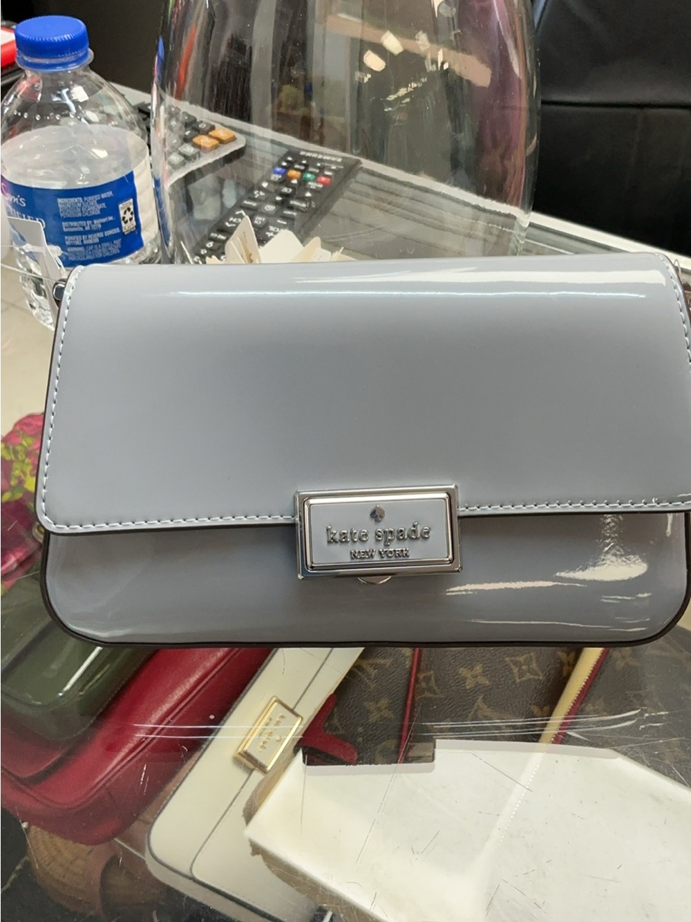 kate spade Glossy Light Gray Patent Mini Crossbody Bag